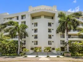 Chic coastal condo with private balcony, pool access & steps to the beach