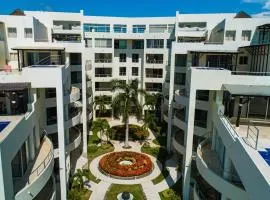 Ocean-view condo with private rooftop pool, terrace, & resort-style pool