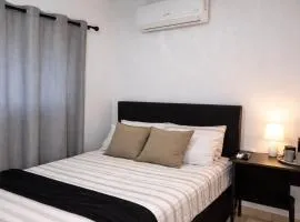 Sunlit Retreat Private Flatlet with Solar Power Pool Fast WiFi & Secure Parking