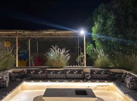 Liwa sunrise Farm โรงแรมในLiwa