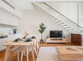 Elegant Loft Living w Soaring Ceilings