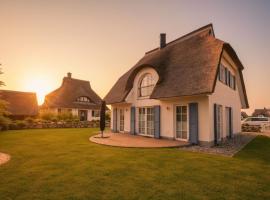 Ferienhaus Dwarslöper mit Sauna und Garten in Fuhlendorf、Fuhlendorfのホテル