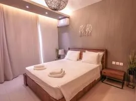 Delfini beach hotel & suites