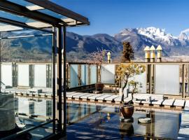 Wumo Qinglu Snow Mountain Museum Hotel, hotell i Baisha