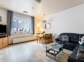 Groth´s Ferienwohnung, מלון בLunden