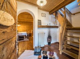 Thaler-hof Ferienhaus Lärchnhittl, Hotel in Algund