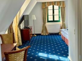 Hotel und Gasthof Wasserburg zu Gommern، فندق في Gommern