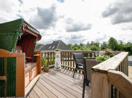 Ferienwohnung Huus 39، فندق في Ostenfeld