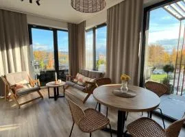 Apartament dwupoziomowy Premium nad jeziorem z dostępem do sauny siłowni