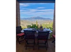 Sunny hillside casita in Guaro