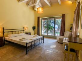 Menagia Village, hotell i Agios Georgios