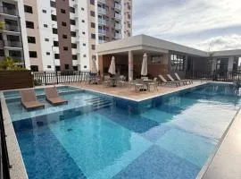 Lindo apto no Cond Lunar Nova Aruana - Vista para o mar, piscina, parquinho e academia