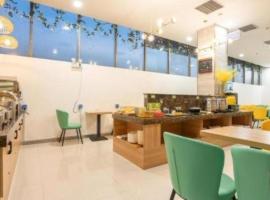 GreenTree Inn Jining Yanzhou Jiuzhou Fangyuan Business Hotel, hótel í Yanzhou