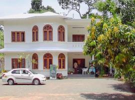 Munnar में, होटल Alhind Residency , Valara, Munnar