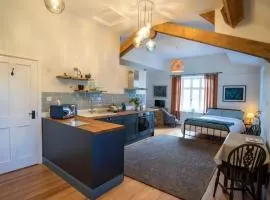 The Coachmans Quarters at Brantwood, studio apartment with stunning views and lake access