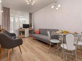 Seaside Apartment in the Woods with Balcony & 1 Bedroom by Noclegi Renters