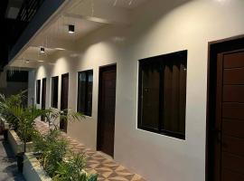 Escubin Travellers Inn, hotel em San Miguel
