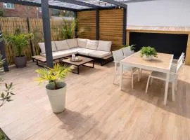 La Parenthèse Dunkerquoise - Appt luxe, balnéo, jardin et garages avec chargeur vh électrique