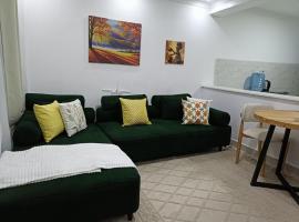 Naivegas-Staycation by Winnie-2 bedrooms, hotell i Munyu