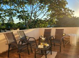 Depto privado con gran terraza y parking gratis, hotel a Encarnación