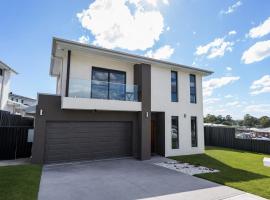 Macarthur Stay - Spacious 4BR Home with Outdoor Area, hotel en Campbelltown