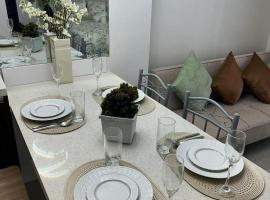 Tambuli Seaside Living Condo and Resort-Tower F, hotel i Lapu Lapu City