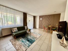 NEU 2 Raum Wohnung 5Betten Apartmenthaus-Usedom "Kajüte 2" mit Garten - In 5  Minuten zu Fuß am Strand, khách sạn ở Kolpinsee