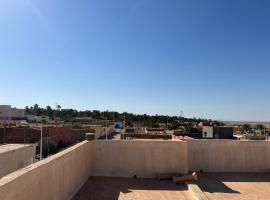 Sahara Oasis Lodge, hotel i Shabīkah