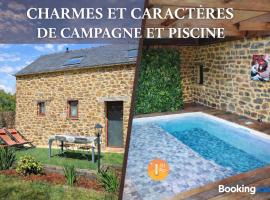 Piscine avec Charme et Caractères de campagne โรงแรมในTinténiac