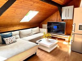 Zentrale Dachgeschosswohnung mit gemütlichem Charme, Hotel in Herten