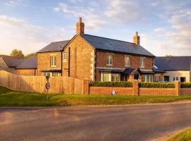 The Old Pub Unique Retreat Luxury Large Private Self Contained Cellar with Sauna Gym King Size Bed Kitchenette Dining Area Snacks Mini Bar and Optional Full Continental Breakfast Historically The Wiltshire Yeoman Pub built in the 1800s