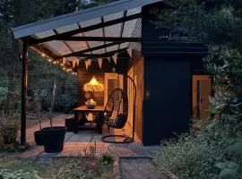 Dromen op 1 - Stijlvol boshuis op de Veluwe met veranda en grote omheinde tuin!