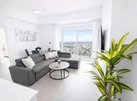 Skyline Luxury Suite Floor to Ceiling Views King Bed Balcony