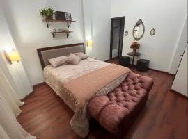 HABITACION MODERNA CON PARQUEO y WIFI, khách sạn ở Ambato