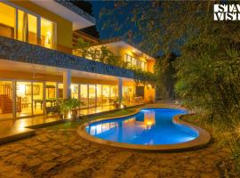 StayVista at The Hideout Farms with Lawn and private Pool โรงแรมในKurukshetra