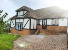 Modern Tudor home, sea views