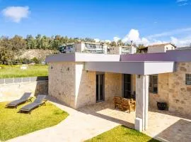 AG Stone Home - Idyllic Beachside Villa in Isthmia