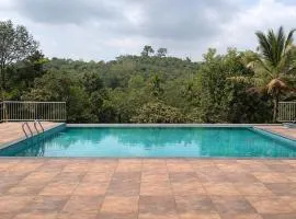 Holiday Courtyard Wayanad