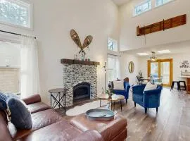 Riverfront retreat with panoramic river and forest views