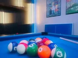Theater • Game Room • Fire Pit • Grill • Sleeps 15