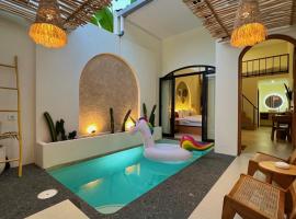 Numar Villas Jogja, מלון בSeturan