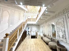 Hotel Abu Bakr terrace، فندق في بوكسورو