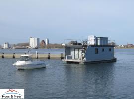 Hausboot Kaddi`s Sunshine - Huus & Meer, hótel í Fehmarn