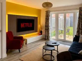 CHARMING VILLAGE HOME, stylish interior, FREE PARKING for 2 cars, private rear garden, 2 DOUBLE BEDROOMS and easy access to M1