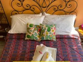 "Little Sicilian Home"-room with a private bathroom & kitchen -fridge - and shared a beautiful terrace on Hostel Taormina Center