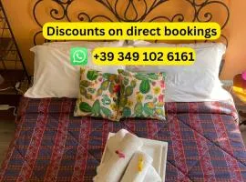 "Little Sicilian Home"-room with a private bathroom & kitchen -fridge - and shared a beautiful terrace on Hostel Taormina Center