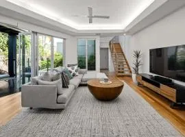 Modern airy duplex steps to River heated pool