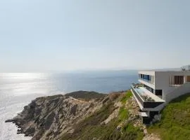 Seafront Cliff Villa with Infinity Pool & Wellness, By ThinkVilla