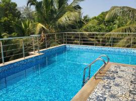 Calangute house inn, hotel en Calangute