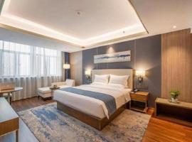 The Long Red Hotel Daye Huangshi، فندق في Daye